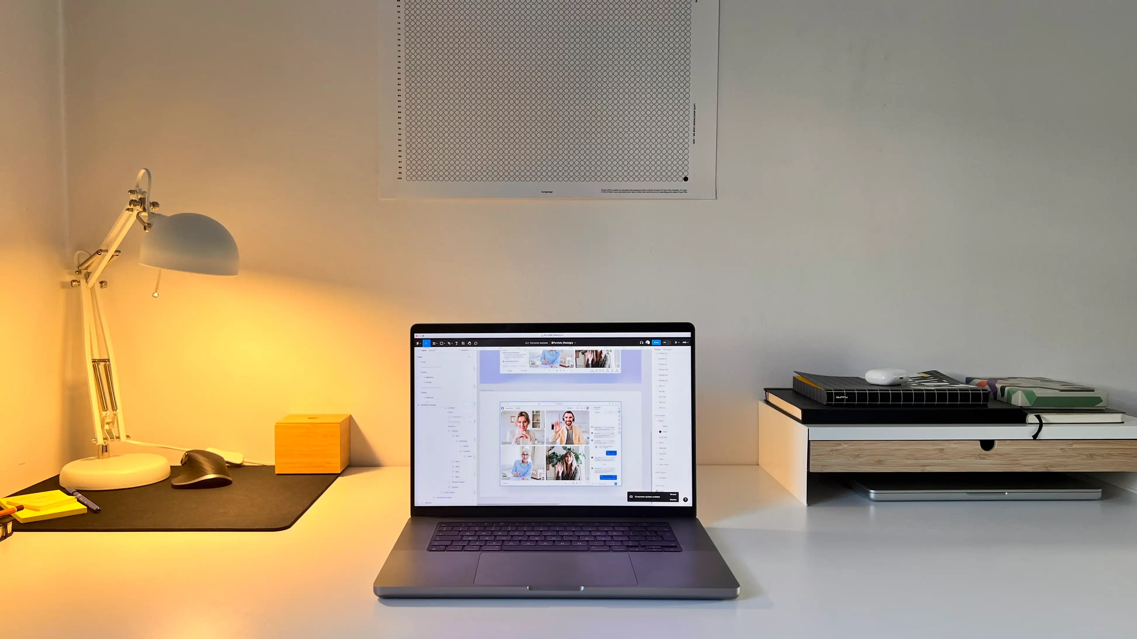 Photo of a laptop computer on a white desktop
